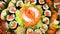 Japanese food sushi and sashimi composition plate panoramic top view
