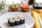 Japanese food tamago maki sushi on white plate