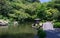 Japanese Garden covered by green Landscape. Taken in the wonderful Sengan-en Garden. Located in Kagoshima, Kyushu, South of Japan