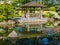 Japanese garden design with water stream and gazebo