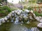 Japanese Garden with Rock Waterfall or Babbling Brook