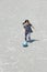 Japanese girl dribbling soccer ball