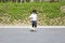 Japanese girl dribbling soccer ball