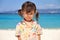 Japanese girl standing by the seaside