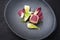 Japanese gourmet fried tuna fish steak tataki with pak choi, witloof and red beet on a modern design plate