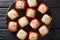 Japanese healthy rice dessert mochi daifuku with anko and sesame seeds close-up. horizontal top view