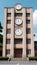 Japanese high school facade building with time clock in traditional classic style