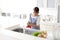 Japanese housewife washing vegetables