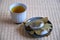 Japanese Kashiwa mochi and green tea on tatami.