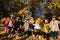 Japanese kids having fun with autumn leaves