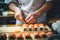 In a Japanese kitchen, a skilled chef\\\'s hands meticulously craft sushi rolls, embodying Asian culinary mastery