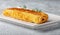 Japanese kitchen. Tamagoyaki - Japanese omelet, rolled several layers of fried egg