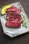 Japanese Kobe Steak Fillet offered with Avocado  on a modern design plate