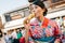 Japanese lady eating delicious matcha ice cream