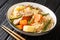 Japanese Meat and Potato Stew Nikujaga close up in bowl. Horizontal