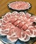 Japanese nabemono hotpot dish of thinly sliced meat boiled in water served with dipping sauces, also known as Shabu-shabu. The foo