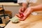 Japanese Omakase chef making Chutoro Sushi Medium Fatty Bluefin Tuna neatly by hands. Japanese traditional, authentic and luxury