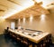 Japanese Omakase Restaurant that decorated mostly with wood. Chef cooking in kitchen counter and serve menus to customer