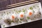 Japanese onigiri with salmon and sesame close-up. horizontal top