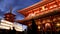 Japanese Pagoda and hozomon gate at senso-ji shrine in Tokyo after sunset.