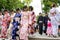 Japanese people in beautiful traditional Japanese clothes - kimono - on Sunday on the way to the temple.
