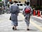 Japanese people couple lovers wearing traditional japan clothes yukata walking go to travel visit and respect praying god deity