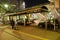 Japanese people driving taxi stop waiting traveler and passenger use service at bus station in night time at Narita town of Chiba