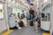 Japanese people in the subway train, some are wearing mask