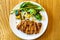 Japanese pork Tonkatsu homemade with fresh vegetable serve on table.