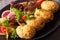 Japanese potato croquet and vegetable salad close-up. horizontal