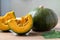 Japanese pumpkin or Kabocha on wooden table