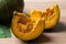 Japanese pumpkin or Kabocha on wooden table