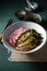 Japanese ramen. Asian soup with noodles ramen, miso, fried tuna steak and seaweed algae