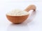 Japanese rice, the short rice used for sushi in wooden spoon wit