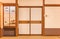 Japanese room featuring tatami mats, fusuma doors and shoji window evocating a landscape of the mount Fuji.