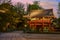 Japanese Sakuramon gate in Nezu shrine at sunset.