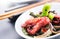 Japanese salad with octopus and ginger. Healthy food. Seafood closeup over black