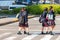 Japanese schoolgirl on a city street, Kyoto, Japan. Copy space for text.