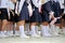 Japanese schoolgirls waiting in line