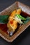 Japanese simmered flounder on a dining table