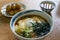 Japanese soba rament soup with egg and seaweed and grilled dumplings