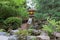 Japanese Stone Lantern by the Creek