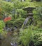 Japanese Stone Lantern by Water Stream