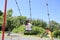 Japanese student girl on the swing appearance from behind