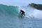 Japanese surfers in Chiba Japan surfing Hebara Beach which is close to Tokyo.