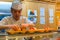 Japanese sushi chef prepares dishes of traditional sushi