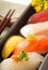 Japanese sushi nigiri with lemon and chop sticks