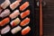 Japanese sushi platter various different with chopsticks top view