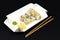 Japanese sushi rolls in white eco paper disposable box