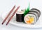 Japanese sushi traditional food with chopsticks